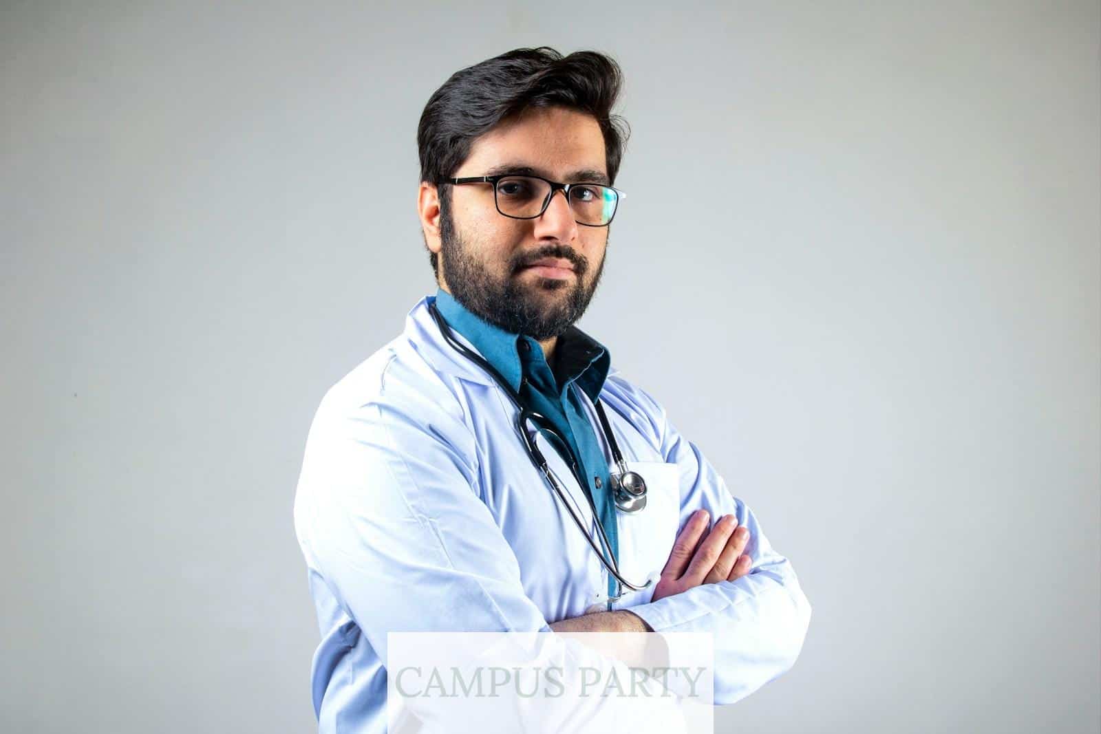 man in white dress shirt wearing black framed eyeglasses