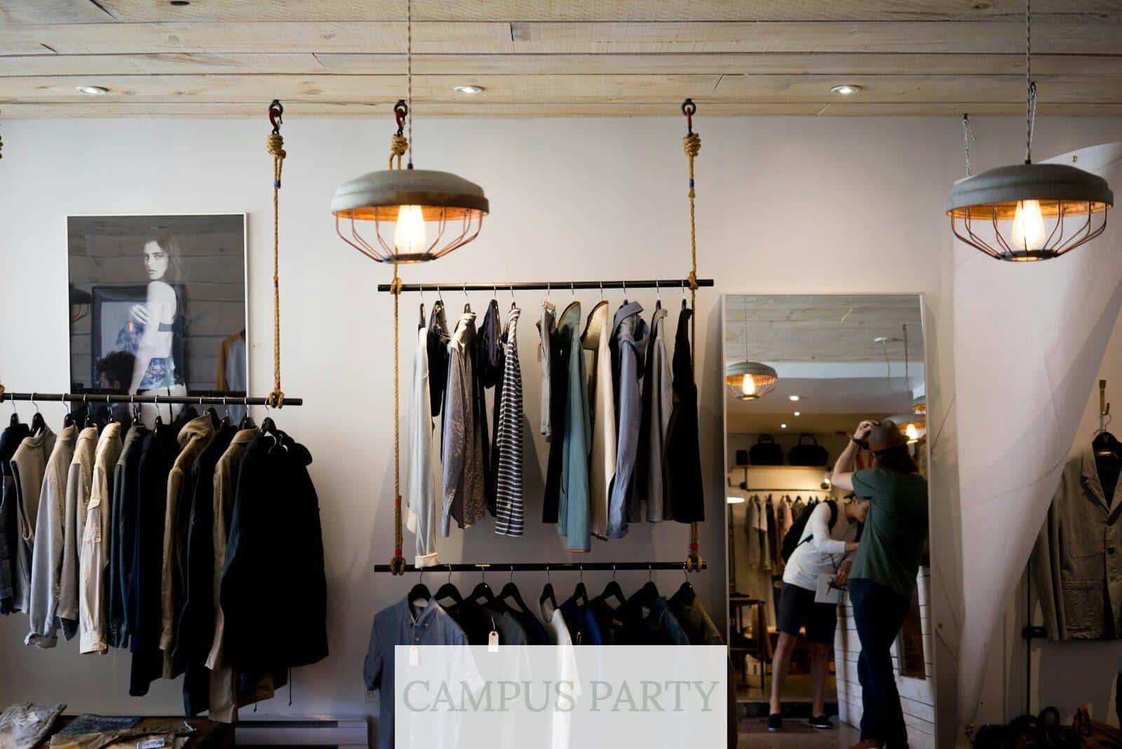 clothing boutique interior with hanging racks